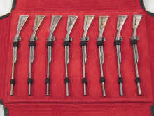 A soft leather pouched set of eight 14dece