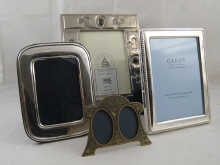 A strut back double oval photo frame