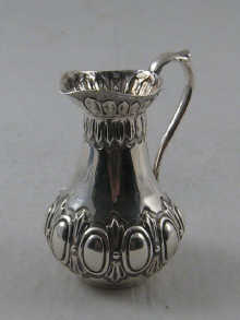 A Victorian silver cream jug Lias