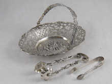 A Dutch silver swing handled sweetmeats