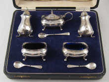 A boxed silver cruet of a pair of peppers