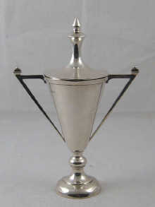 An Art Deco silver trophy cup and 14deef