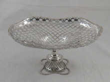 A silver footed cake stand the bowl