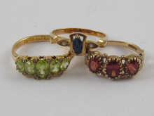 An 18 ct gold gem set ring together