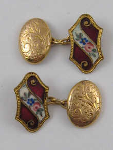 A pair of cufflinks with enamel 14df38