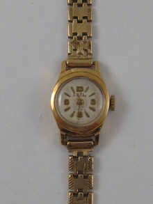An 18 ct gold lady s wrist watch 14df4a