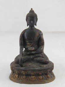 A parcel gilt bronze Buddhist figure 14df76