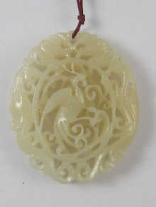 A Chinese pierced nephrite pendant 14dfa6