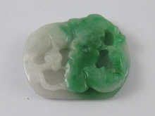 A Chinese green coloured jadeite pendant