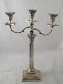 A silver three light candelabrum