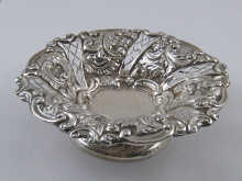 A silver embossed and pierced sweetmeat