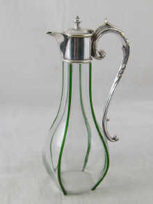 A silver plate mounted claret jug the