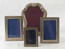 Silver photo frames. A pair rectangular