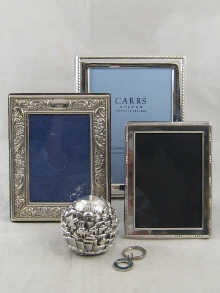 Two hallmarked silver photo frames and