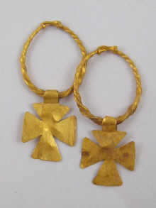 A pair of yellow metal (tests high