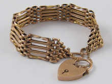 A 9 ct gold five bar gate bracelet.