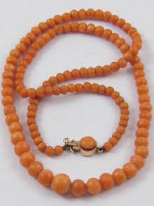 A graduated coral bead necklace