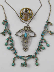 A turquoise necklace set in white