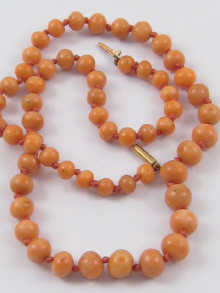 A graduated coral bead necklace