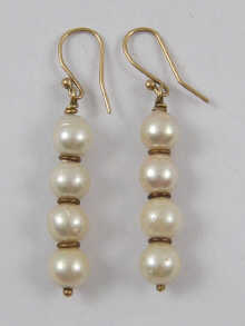 A pair of cultured pearl earrings 14e01d