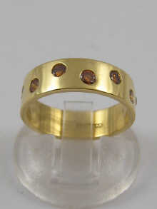 A hallmarked 18 ct gold band ring
