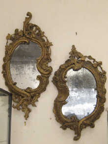 Two rococo carved wood and gesso