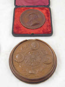 A bronze medallion celebrating 14e07c