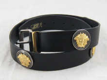 A leather Versace studded belt