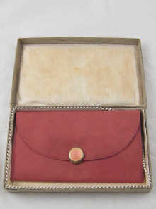 A fine suede purse retailed by 14e086