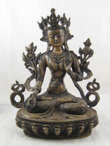 A bronze Tibetan deity circa 1920