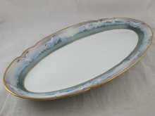 A long oval ceramic fish plater 14e0a1