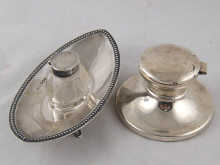 A silver capstan inkwell 9cm dia  14e0ad