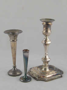 A silver candlestick in the early