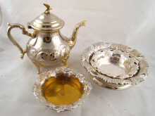 Silver plate. A teapot a pair of decanter