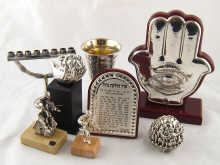Judaica. Four silver cased items