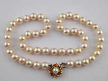 A cultured pearl necklace the pearls 14e10a