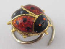 A fine enamelled ladybird tie pin