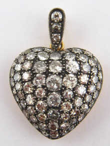 An antique pave set diamond heart 14e11c