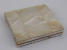 A mother of pearl box 9x8cm.