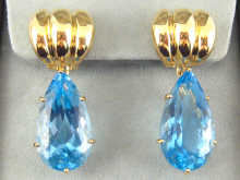 A pair of 18 carat gold and blue