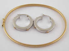 A 9 carat gold bangle together 14e13b