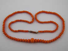 A graduated coral bead necklace