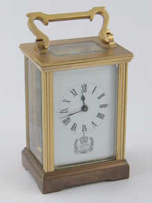A brass carriage clock with commemorative 14e178