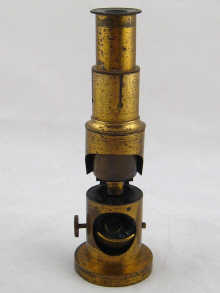 A small 19th. century microscope ht