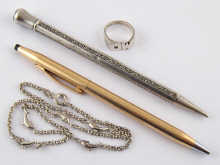 A gold plated cross ball point