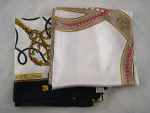 A Hermes silk scarf together with