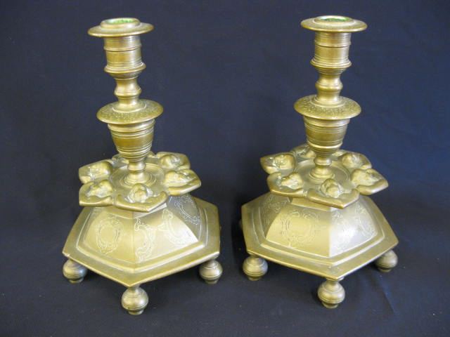 Pair of Early Brass Candlesticks footed