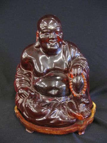 Carved Cherry Amber Figurine of