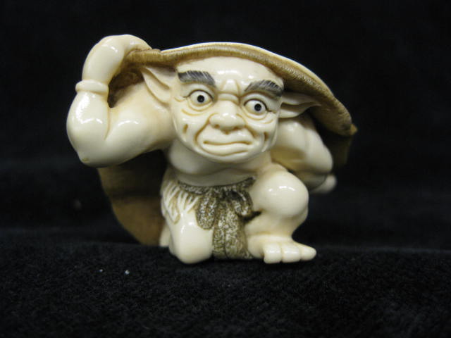 Carved Ivory Netsuke of an Oniunder 14e6a7