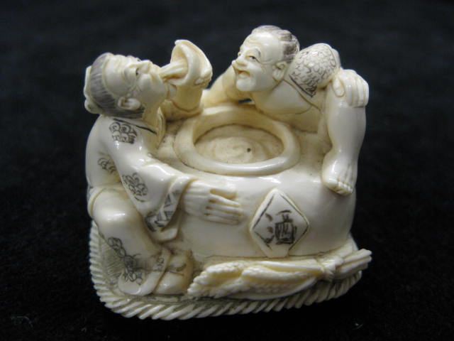 Carved Ivory Netsuke of Two Peopleeating